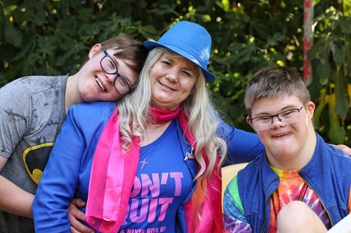 Joseph (left) and Ben (right) with their mum Sheryl (centre)