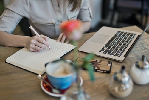 A person taking notes