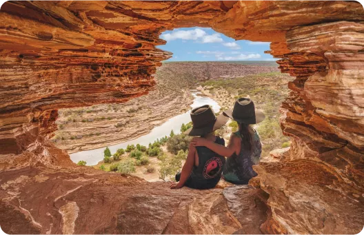 a person sitting in a canyon