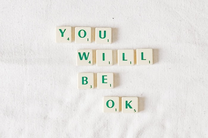 An image of Scrabble tiles that spell out 'YOU WILL BE OK'