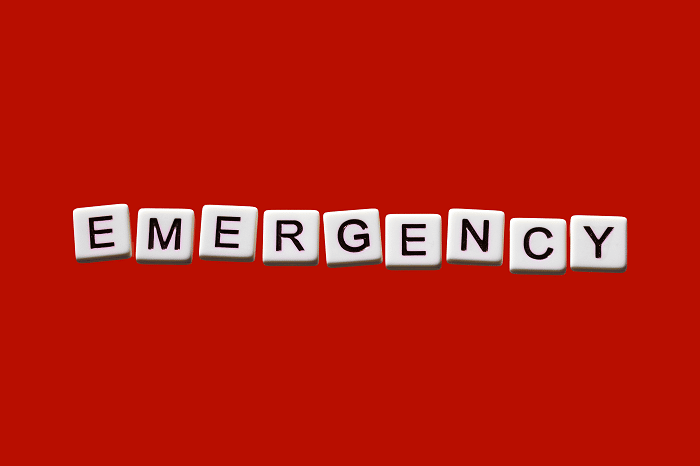 Letters that read 'emergency' with a red background