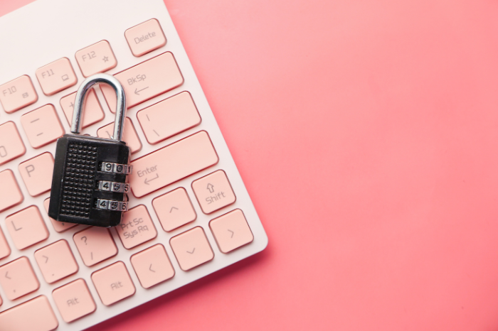 A padlock on a keyboard representing cyber security.